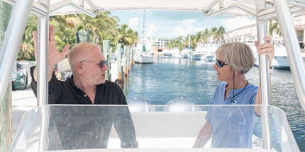 Man and woman on a boat in the ocean