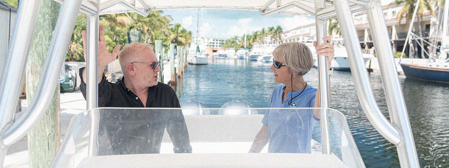 Man and woman on a boat in the ocean